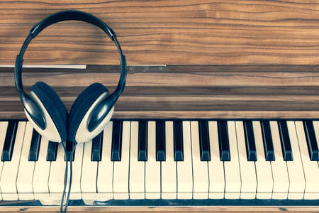 headphone on piano keys. music backgroundの写真素材
