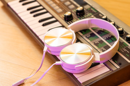 white headphone on synthesizer keyboard. music backgroundの写真素材