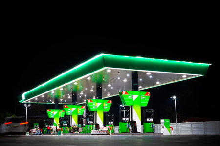 green petrol station at nightの写真素材