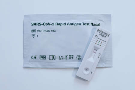 Closeup view of SARS-CoV-2 rapid antigen test nasal. Self test verifies positivity covid-19. Health,...
