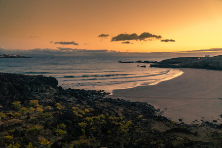 Sunset beach landscape silhouette. Traveling in Europe. Beautiful holiday panorama ocean and sun...