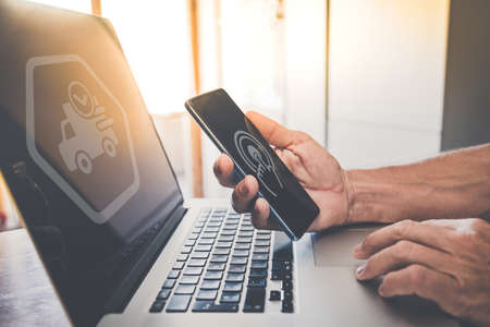 Hands typing on keyboard. E-commerce, logistics and delivery concept icons. Shopping online with...