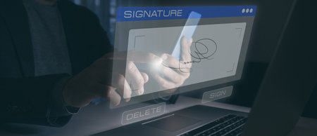 Man hand writing electronic signature on virtual display. Sign contract and business agreement.