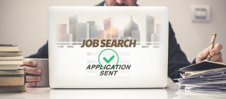Man search job online on laptop. Find occupation on tablet. Recruitment, business, hiring concept.の写真素材