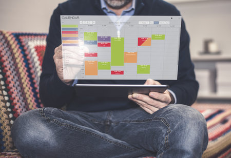Calendar software showing schedule with many tasks. Businessman time management organization conceptの写真素材