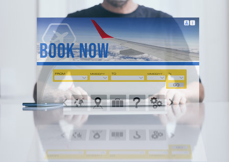 Man search tickets vacation on laptop virtual screen. Booking flights. Plan travel and book holidaysの写真素材