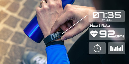 Man running in the park. Runner check heartbeat, steps and distance. Technology, health concept.