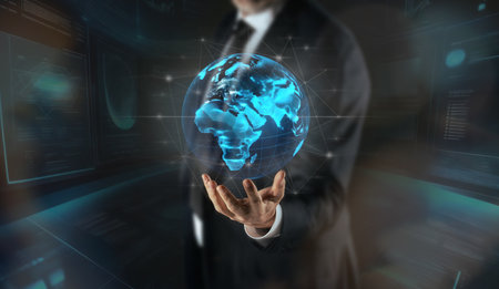 Human hand holding planet Earth hologram. World in man hands. Save Earth, care, environment concept.の写真素材