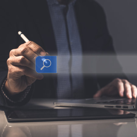 Businessman use laptop for searching online. Search engine bar. Browsing Internet concept.の写真素材
