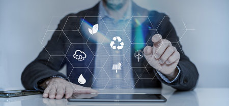 Man use a notepad to analyze ESG. Business investment strategy economy. Environment social...