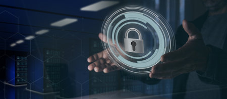 Cyber security, protection concept. Man hands holding a virtual padlock. Data center in the...