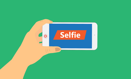 Hand hold smart phone selfie on mobile camera.のイラスト素材