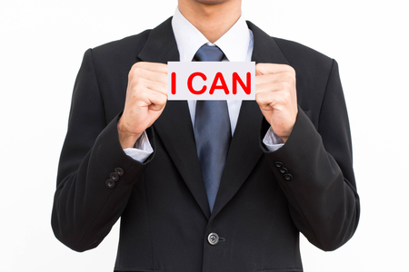 Business man hold i can wordの写真素材