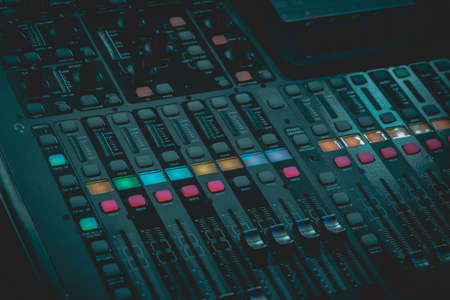 Sound and audio mixer control panel with buttons and slidersの写真素材