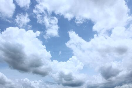 Fantastic sky with mix of white and dark cloudsの写真素材