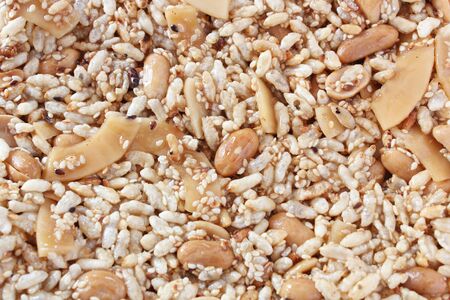 Close up view of Krayasart, Thai sweet made of rice, nut, sesame-seeds and sugarの写真素材