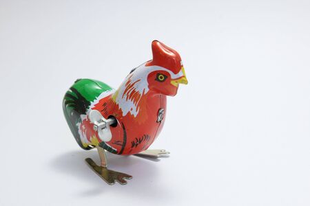 Thai vintage toys, colorful chicken made from zinc on white backgroundの写真素材