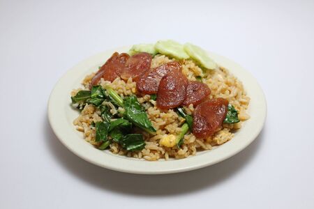 Fried rice with Chinese sausage and egg isolated on white background, top viewの写真素材