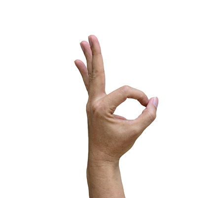 Conceptaul sign of OK hand for and agreement isolated on white backgroundの写真素材