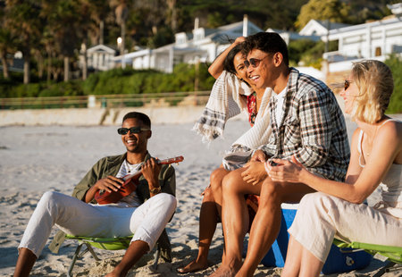 Friends Listening to A Ukulele on the Beachの写真素材