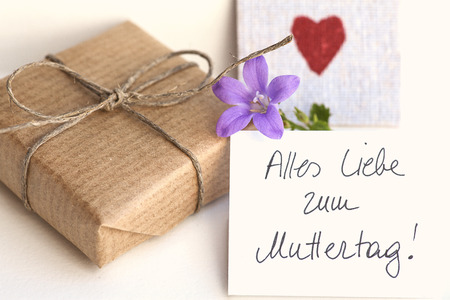 gift, flower and heart for motherの写真素材