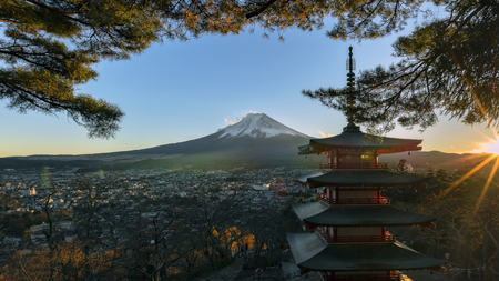 Views of Mount Fuji. Looking through the red pagoda at sunset.のeditorial素材