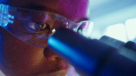 Research Chemist Analyzing Chemical Samples in Neon-Lit Laboratory Environment