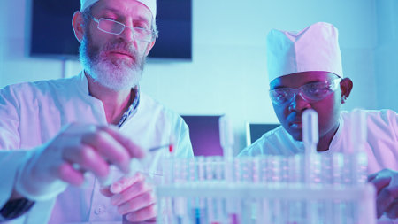 Innovative Research in a Modern Laboratory With Chemists Analyzing Experiments and Data