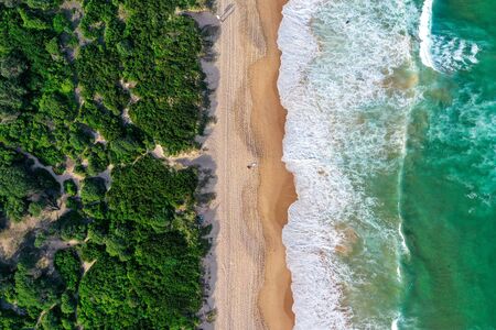 Beach aerial view from drone beach shadow people sunriseの写真素材