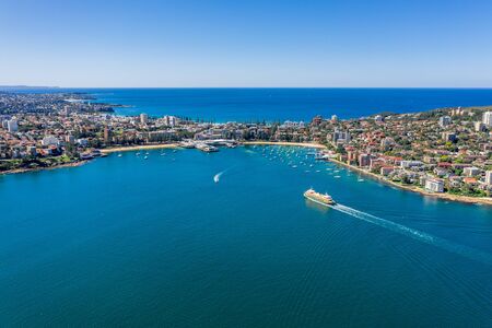 Aerial view on famous Manly Wharf and Manly, Sydney, Australia. View on Sydney harbourside suburb from above. Aerial view on Sydney North Harbour, Manly and Manly Wharf.の写真素材