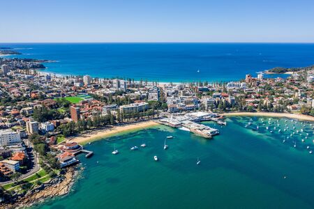 Aerial view on famous Manly Wharf and Manly, Sydney, Australia. View on Sydney harbourside suburb from above. Aerial view on Sydney North Harbour, Manly and Manly Wharf.の写真素材