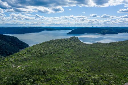 Aerial view of hills, forest and Hawkesbury River at Ku-ring-gai Chase National Park, New South Wales, Australiaの写真素材