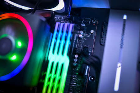 Close up of a computer motherboard, RGB memory and RGB CPU fanの写真素材