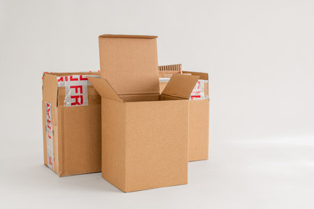 Empty cardboard boxes isolated on the white backgroundの写真素材