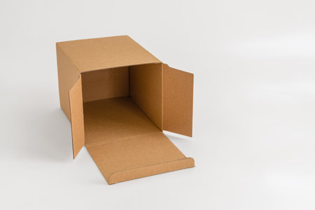 Empty cardboard box isolated on the white backgroundの写真素材