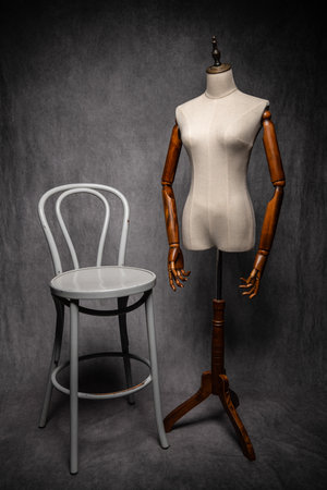 Wooden female dressmakers mannequin, retro style with arms and adjustable standの写真素材