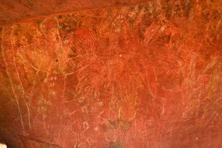 Aboriginal rock art at Uluru Kata Tjuta National Park in Central Australian Desertの写真素材