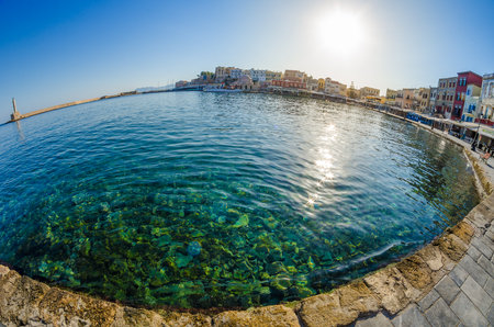 Chania, Greece - September 20th 2015 - View of old Venetian Port of Chania. Landmarks of Crete island in Greece. Bay of Chania or Hania on a sunny summer day.の写真素材