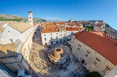 Dubrovnik, Croatia - September 22nd 2015 - Panoramic view of the Onofrio's Large Fountain, circular spring water fountain built in 1438 and decorated with ornate, carved-stone masks. Dubrovnik, Croatia.のeditorial素材