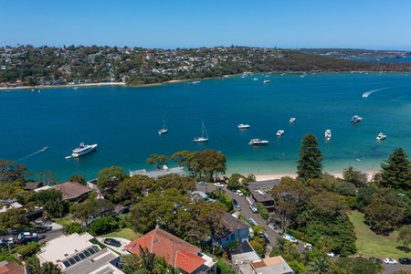 Panoramic drone aerial view over Cobblers Bay and Chinamans Beach in Mosman, Northern Beaches area of Sydney, Australia.の写真素材
