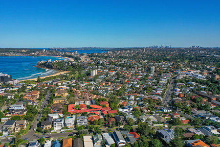 Panoramic drone aerial view over Freshwater, Queenscliff and Manly in the Northern Beaches area of Sydney NSW Australia, CBD in the distance.の写真素材