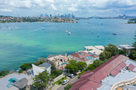 Drone aerial view of Rose Bay, eastern suburb of Sydney with Harbour Bridge and Opera House in the distanceの写真素材