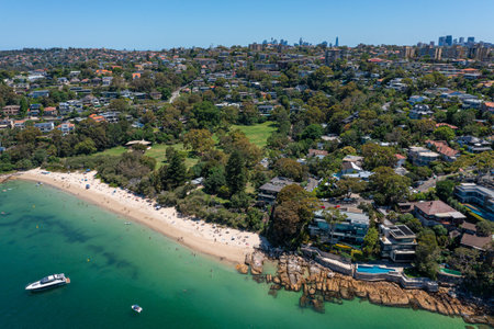 Panoramic drone aerial view over Cobblers Bay and Chinamans Beach in Mosman, Northern Beaches area of Sydney, Australia.の写真素材