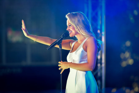 Sydney, Australia - December 4th, 2020: Samantha Jade performs on the stage during the Royal Randwick Christmas Festival at Royal Randwick racecourse.のeditorial素材