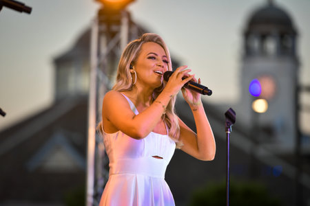 Sydney, Australia - December 4th, 2020: Samantha Jade performs on the stage during the Royal Randwick Christmas Festival at Royal Randwick racecourse.のeditorial素材