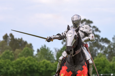 Knight jousting. Medieval knights during a jousting tournament. Knights competition.
