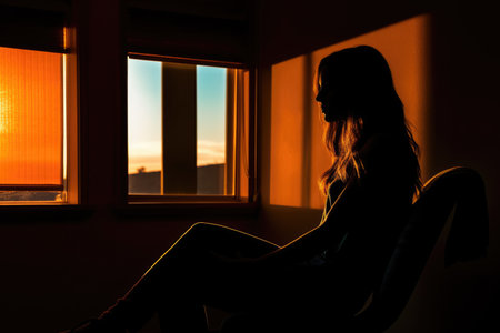 A woman sitting in a chair in front of a window, Generative AIの素材