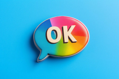 A colorful speech bubble with the word ok on itの素材