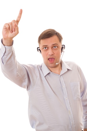 young man with headset talking on a white backgroundの写真素材