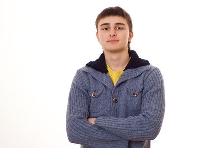 handsome young man standing on a white backgroundの写真素材